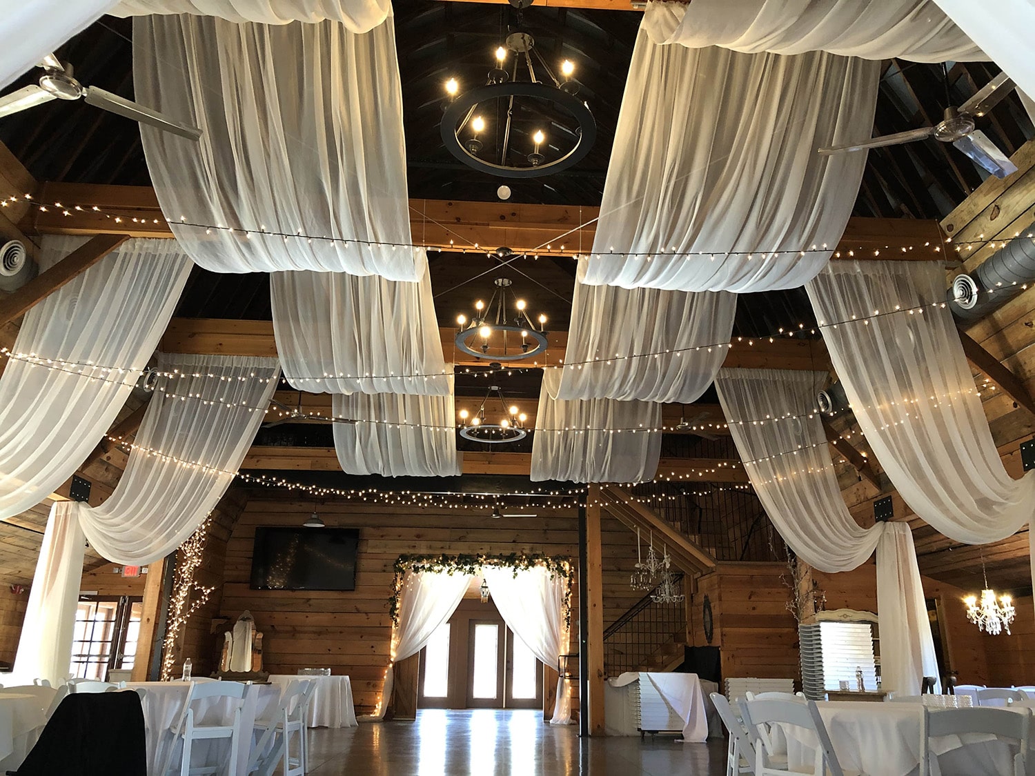 Stunning drapes across the ceiling at a wedding