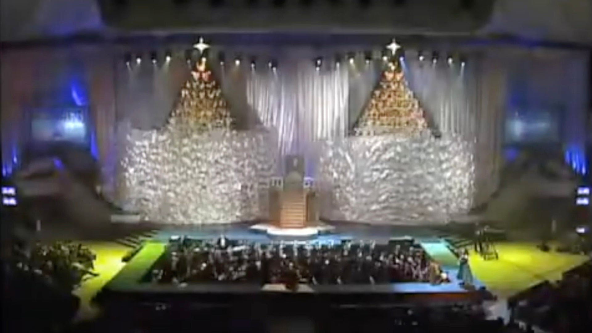 Kabuki Drop as curtains fall from the ceiling to reveal Christmas trees