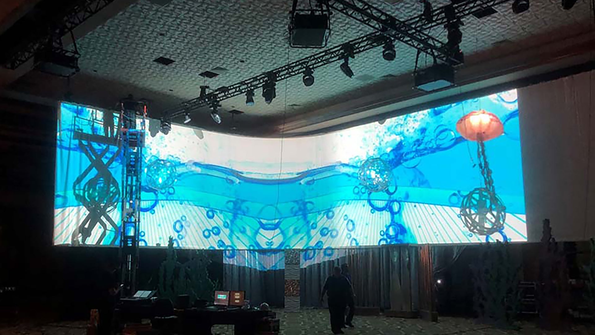 Large cyclorama with projection of blue water